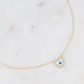Collier avec petit papillon en émail et serti de zirconiums